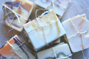 handmade bundles of soap ends and slices wrapped in twine - ubu soap n' bees